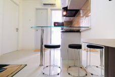 Khu vực công cộng Cozy 2BR with Mall Access at Bassura City Apartment By Travelio