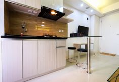 Khu vực công cộng 4 Cozy 2BR with Mall Access at Bassura City Apartment By Travelio