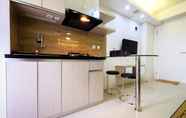 Common Space 4 Cozy 2BR with Mall Access at Bassura City Apartment By Travelio