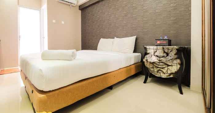 Bedroom Simple Studio Apartment at Bassura City By Travelio