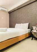 BEDROOM Simple Studio Apartment at Bassura City By Travelio