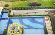 Swimming Pool 7 Simple Studio Apartment at Bassura City By Travelio
