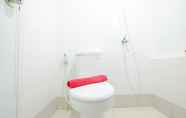 Toilet Kamar 6 Clean & New 2BR Bassura City Apartment By Travelio