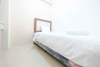 Bilik Tidur 4 Clean & New 2BR Bassura City Apartment By Travelio