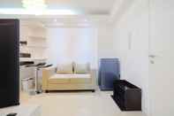 Lobby Clean & New 2BR Bassura City Apartment By Travelio