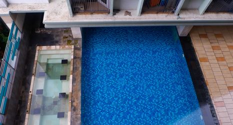 Exterior 2 Pool View Studio at Tamansari Sudirman Apartment By Travelio