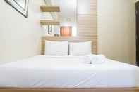 Bedroom Homey 2BR at Tamansari Papilio Apartment By Travelio