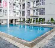 Swimming Pool 7 Modern Cozy Studio at Taman Melati Apartment By Travelio