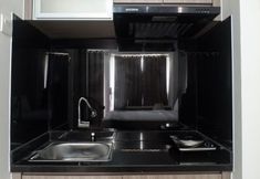 Ruang Umum 3 Modern Studio Apartment at Taman Melati By Travelio