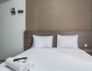 Bedroom 2 Modern Studio Apartment at Taman Melati By Travelio