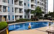 Swimming Pool 6 Comfy Studio at Anderson Tower Supermall Mansion Apartment By Travelio