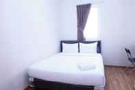 Bedroom Homey 2BR Apartment Palazzo/Grand Palace Kemayoran By Travelio
