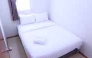 Bedroom 2 Homey 2BR Apartment Palazzo/Grand Palace Kemayoran By Travelio