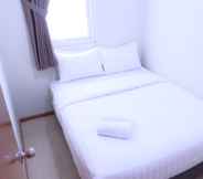 Bedroom 2 Homey 2BR Apartment Palazzo/Grand Palace Kemayoran By Travelio