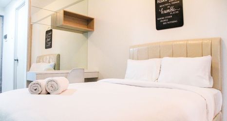 Bedroom 2 Cozy and Elegant Studio Akasa Apartment By Travelio