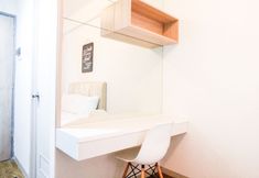 침실 2 Cozy and Elegant Studio Akasa Apartment By Travelio