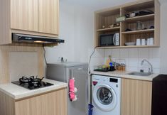 Kamar Tidur 4 Tidy and Modern 2BR Apartment Springlake Summarecon By Travelio