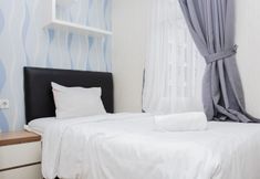 Bedroom 2 Homey and Comfort 2BR at Springlake Apartment Bekasi By Travelio