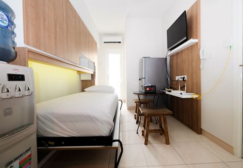 Bedroom  Cozy and Modern 2BR at Springlake Bekasi Apartment By Travelio