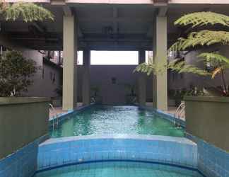 Bangunan 2 Cozy Studio Room Apartment at Grand Asia Afrika By Travelio