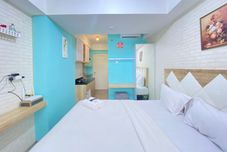 Lobby Comfy and Modern Studio Room at Grand Asia Afrika Apartment By Travelio