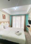 BEDROOM Comfy and Modern Studio Room at Grand Asia Afrika Apartment By Travelio