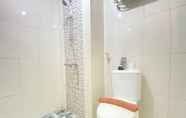 In-room Bathroom 5 Comfy and Modern Studio Room at Grand Asia Afrika Apartment By Travelio
