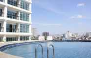 Swimming Pool 6 Spacious and Modern Studio Room at Green Kosambi Apartment By Travelio