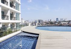 Lobi 7 Spacious and Modern Studio Room at Green Kosambi Apartment By Travelio