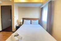 Bedroom Newly Renovated 3BR Apartment with Smart Tv Braga City Walk By Travelio