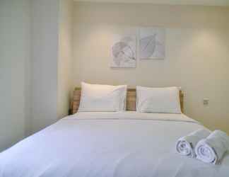 Bedroom 2 Comfy and New 2BR Apartment at Urban Heights Residence By Travelio