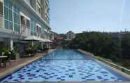 Swimming Pool 7 Spacious Studio near UNPAD at Taman Melati Jatinangor Apartment By Travelio