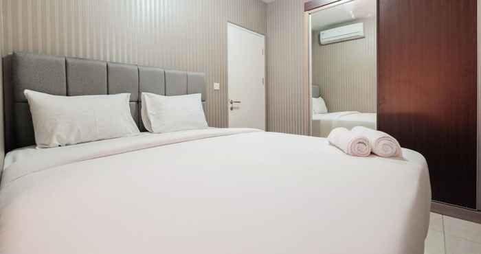 Bedroom 2BR Relaxing Apartment at The Springlake Summarecon By Travelio