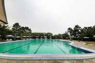 Swimming Pool Comfort Studio No Kitchen at Aeropolis Residence Apartment By Travelio