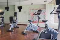 Fitness Center Modern 2BR Apartment at The Kensington Royal Suites By Travelio