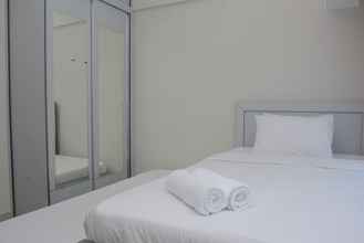 ห้องนอน 4 Simply and Elegant Apartment Studio at Springlake Summarecon  By Travelio