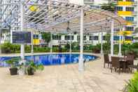 Swimming Pool Simply and Elegant Apartment Studio at Springlake Summarecon  By Travelio