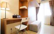 Common Space 2 Modern Studio near to Shopping Center at Green Pramuka City Apartment By Travelio