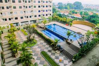 Bangunan 4 Comfortable 2 BR Apartment at Titanium Square By Travelio 