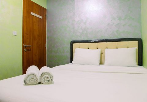 Bedroom Comfortable 2 BR Apartment at Titanium Square By Travelio 