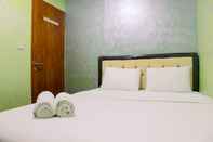 Kamar Tidur Comfortable 2 BR Apartment at Titanium Square By Travelio 