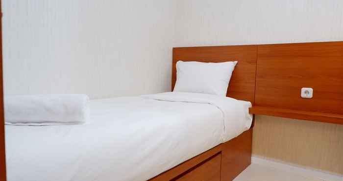 Kamar Tidur Cozy 2BR near Mall Bassura City at Bassura Apartment By Travelio