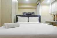 ห้องนอน Cozy Studio Apartment at Tamansari Papilio By Travelio