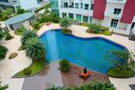 Lobi Woodland Park Residence 1BR Apartement Kalibata View Swimming Pool By Travelio