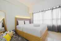 Kamar Tidur Modern and Tidy Studio at Springlake Summarecon Apartment By Travelio