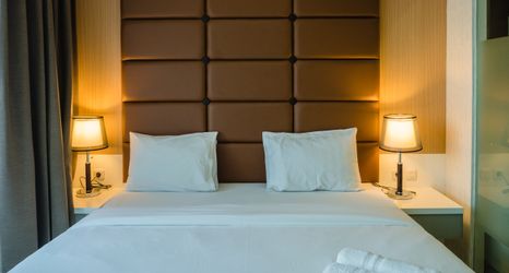 Bedroom 2 Luxurious 1BR Apartment At Dago Suites By Travelio