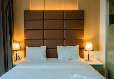 Bedroom Luxurious 1BR Apartment At Dago Suites By Travelio