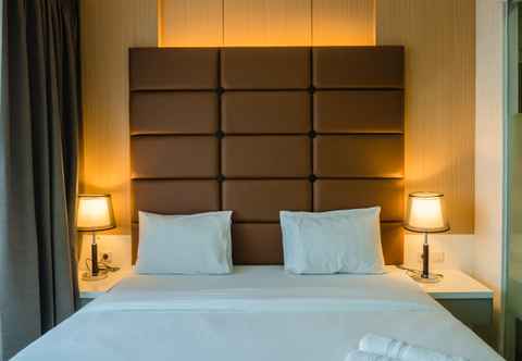 Bedroom Luxurious 1BR Apartment At Dago Suites By Travelio