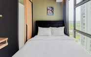 Kamar Tidur 2 Homey and Comfortable 2BR Apartment at M-Town Residence By Travelio