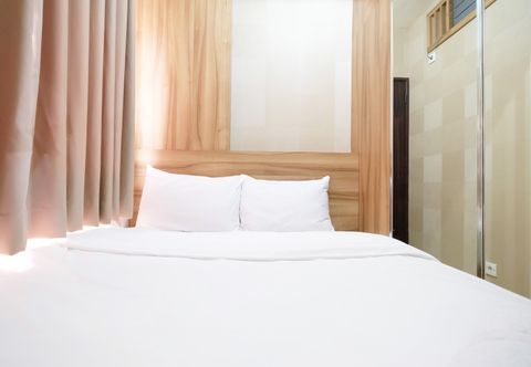Phòng ngủ Minimalist 2BR Apartment at Serpong Greenview By Travelio